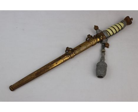 A World War Two German Third Reich Kriegsmarine Officers Dress Dagger, Brass Wire Bound Cellulose Covered Grip, Brass Eagle W