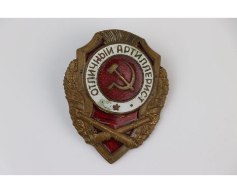 A Russian / Soviet Union Excellent Artilleryman Award Badge, Enamel Detailing To The Front With Screw Back Fixing To The Vers