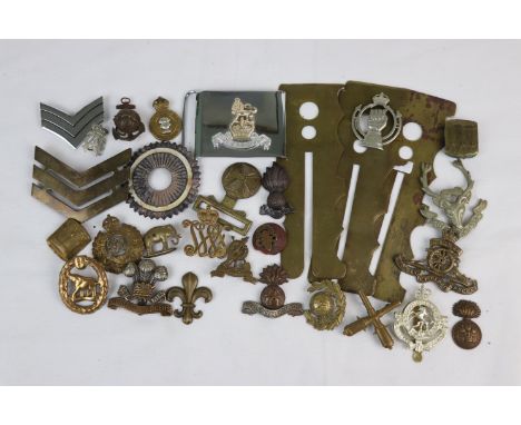 A Mixed Collection Of Militaria To Include Belt Buckles, Brass Button Polishing Guards And A Selection Of Regimental Cap Badg