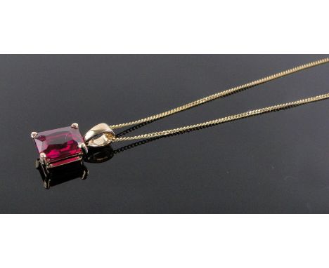 An 18 ct gold ruby set pendant,ruby height 8 mm