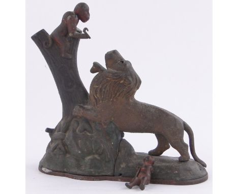 Antique American cast iron automaton money bank in the form of a lion & monkey in a tree,length 9", height 9"