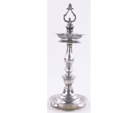 An Unmarked Indian white metal lamp,height 24 cm