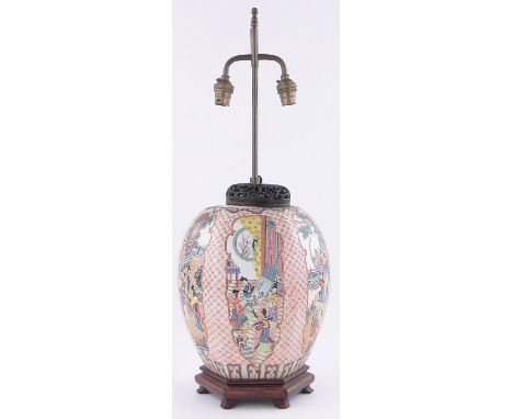 A Chinese porcelain barrel shape table lamp of hexagonal form,with red lattice ground & painted panels depicting figures in g