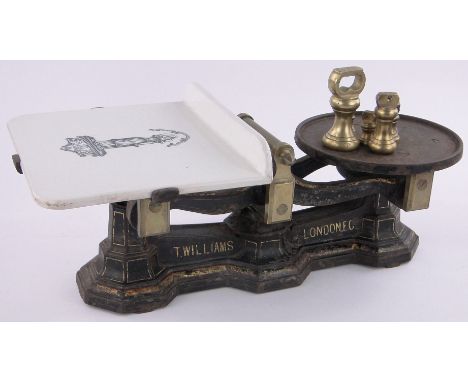 Set of Victorian brass mounted grocers balance scales,with transfer printed ceramic platform, & a set of graduated brass bell