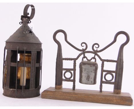 A Victorian metal candle lantern height 12" ,& a folk art bell supported by shepherds crooks (2)