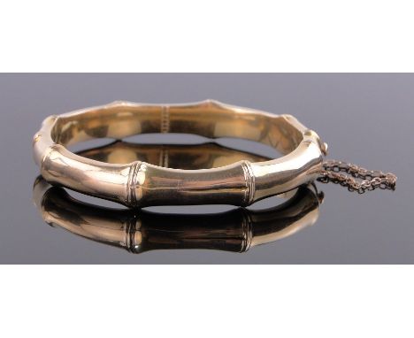 A 15 ct gold simulated bamboo hinged bangle, 16.5 grams
