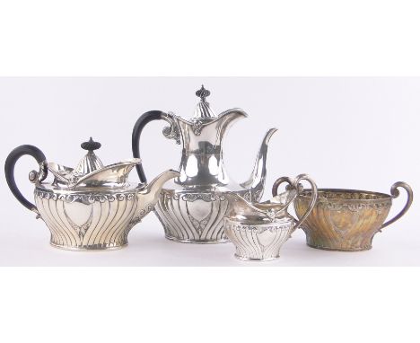 A Late Victorian 4 piece silver tea & coffee service,with chased scroll decorated bodies, maker's marks J R, Sheffield 1896, 