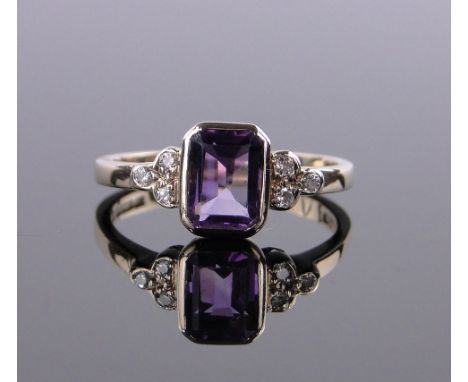 A 9 ct gold square cut amethyst set ring with diamond set shoulders, size N