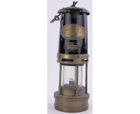 A Thomas & Williams Ltd. brass mounted miners lamp,height 10"