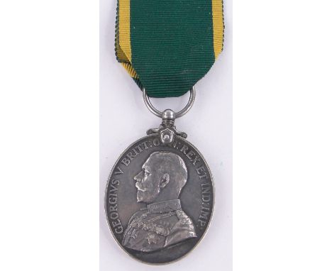 A George V Territorial Efficiency medal to 730095 Sergeant A E Moore, R F A