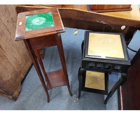 A Victorian ebonized two tier jardinière stand set with Mintons tiles, together with an oak jardinière stand set with a majol