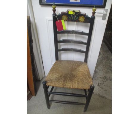 An arts & crafts ladder back chair with painted decoration and a rush seatLocation: 