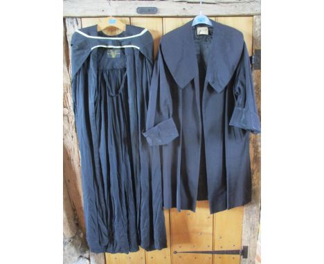 A vintage Harrods black ladies coat having three quarter sleeves with deep fold-over cuffs and a shawl style collar, 40" ches