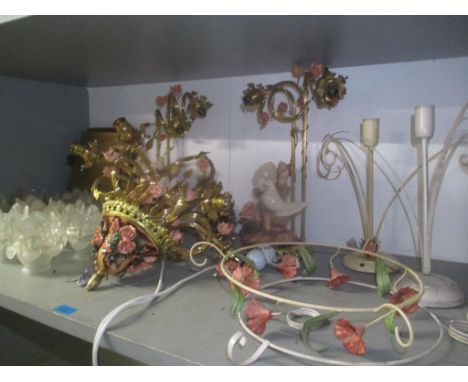 A selection of light fittings to include a pair of porcelain and gilt metal table lamps decorated with birds amongst flora an