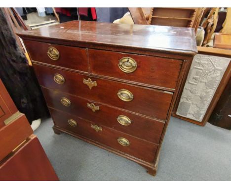 A Georgian oak chest of two short over three long drawers , raised on bracket feet 89cm h x 96cm w x 53cm d Location: 