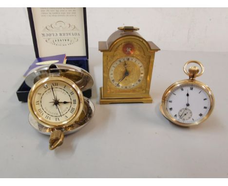 A gold plated pocket watch together with a Swiza clock and modern pocket clocksLocation: Port 