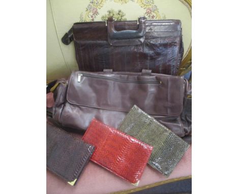A Tuni leather weekend bag, together with three snakeskin clutch bags and a vintage reptile skin briefcase Location: RAB 