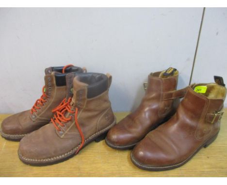Two pairs of gents light to medium brown leather boots to include Timberland with orange laces and Camel, size 9.Condition: T