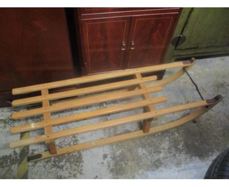 A vintage beech snow sleighLocation: 