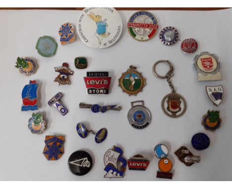 A collection of vintage enamelled metal badges to include Butlins, ski related, Levi's, Arsenal, AOFB, NAO 