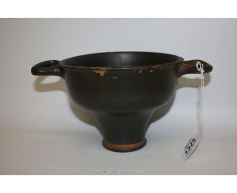 An elegant tall Attic black glazed skyphos Cup, 5th century BC. Intact and with only minor losses to the glaze. Documented pr