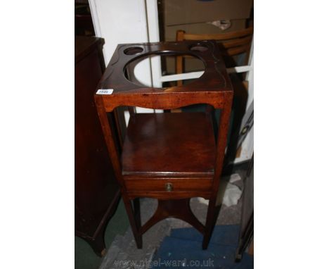 A Georgian Mahogany Washstand, having moulded edge top with central hole for wash bowl and two smaller holes for canisters, l