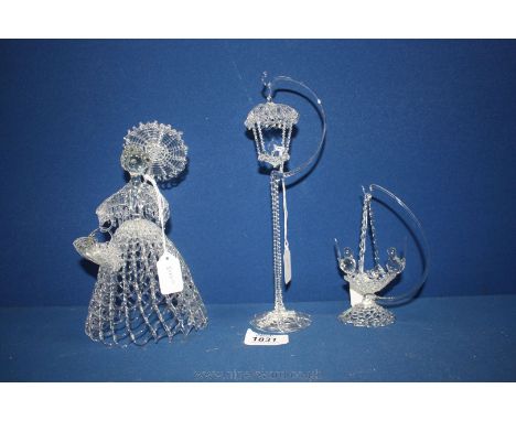 A very elegant spun glass Model of a lady with a parasol carrying a basket, 8'' high together with a Hanging Bird in a house 