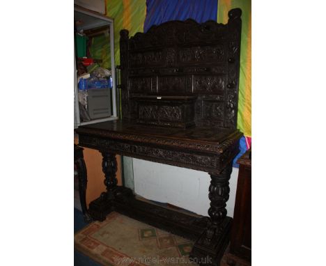 A Superb 19th c. Oak Gothic carved Hall Stand with coat hooks, glove box with single drawer, profusely carved with hunting sc