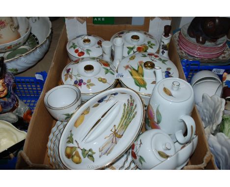 A good quantity of Royal Worcester 'Evesham' pattern table ware including four lidded vegetable dishes, coffee pot, three gra