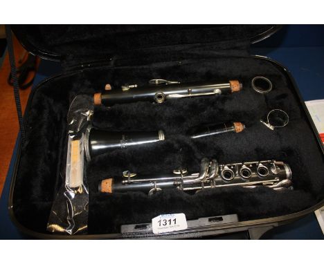A Clarinet and case.