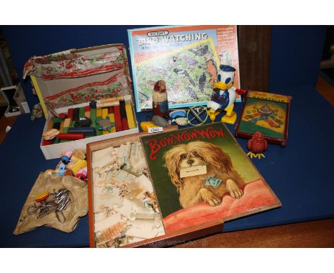 A quantity of old Toys including a wooden bird watching jigsaw, a Bow Wow Wow jigsaw, building bricks, Donald Duck wind up to