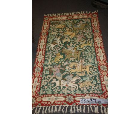 A piece of Crewel work depicting a hunting scene.  58'' x 37''