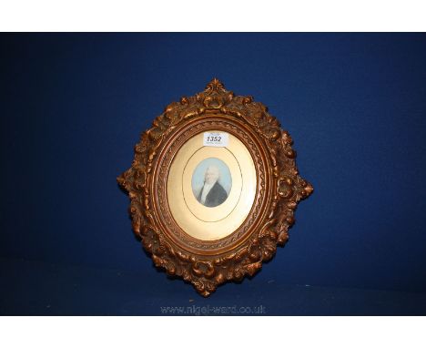 A well-executed oval Portrait Miniature depicting a gentleman with long grey hair dressed in a black jacket and white waistco