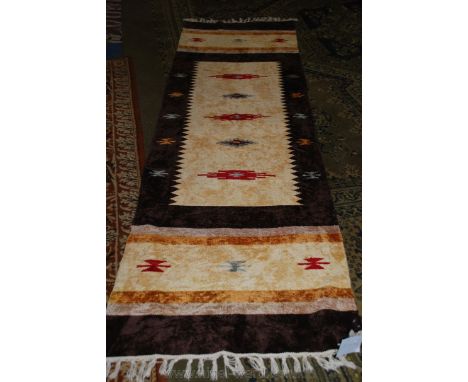 A Nomadic design Runner in velvet fabric, 240 cms x 70 cms.