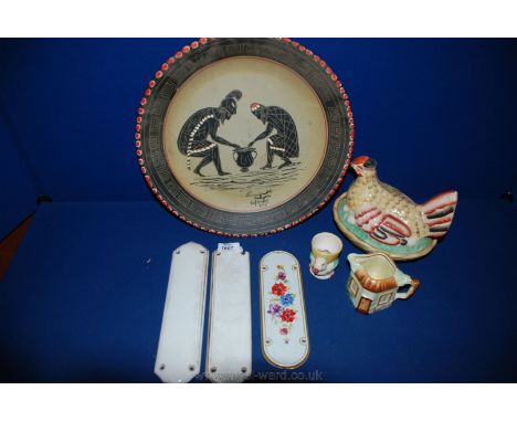 An old Staffordshire Hen and nest, chick egg cup, Paramount pottery cream Jug, wall plaque with ethnic design and ceramic doo