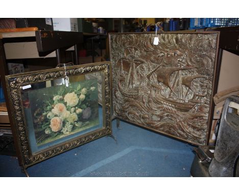 An embossed Copper Firescreen with Viking ship decoration, a/f and a Brass framed Firescreen with mirrored panel having flora