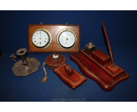 A Chesterman Tape Measure, Barometer, Clock and red leather writing table set.