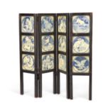JOHN MOYR SMITH FOR MINTON, A SET OF TWELVE 'AESOP'S FABLES' TILES MOUNTED INTO A SCREEN