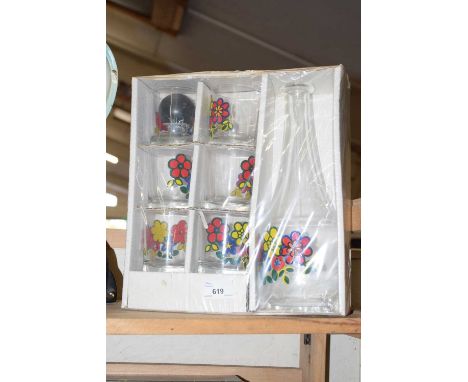 A mid 20th Century flower pattern carafe and six glasses