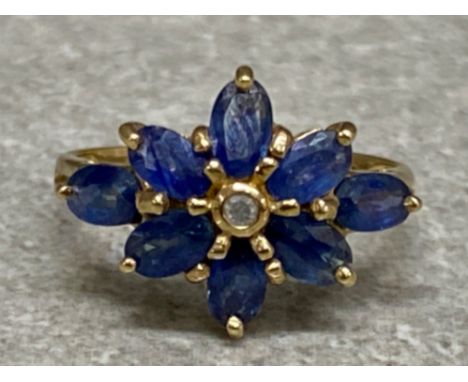 9ct yellow gold, sapphire &amp; diamond ring, - comprises of single diamond surrounded by 8 sapphires - size J, 2.6g