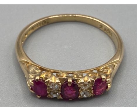 Ladies 18ct yellow gold ruby and diamond ring size O 2.9g gross