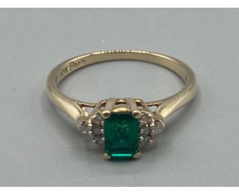 Ladies 9ct yellow gold green stone and diamond ring size O 2.2g gross