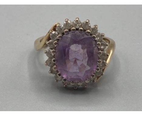 Ladies 9ct yellow gold purple and white stone cluster ring size P 3.8g gross