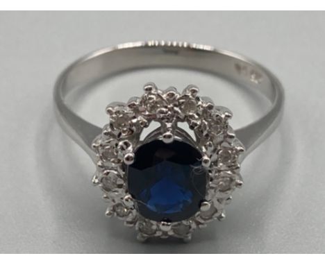 Ladies 14ct white gold sapphire and diamond cluster ring size P 3.1g gross