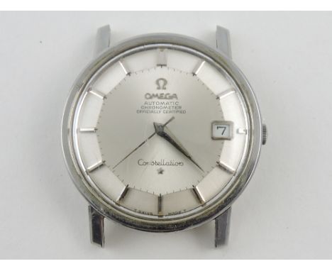 An Omega constellation stainless steel gentleman's wristwatch head with date aperture and baton numerals.