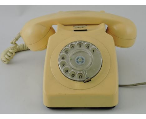 An GPO cream 746F telephone, with On/Off button.