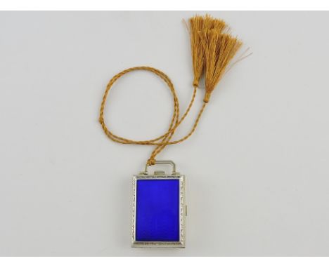 An early 20th Century French blue enamel silver ladies compact of case form, opening to reveal a hinged mirror, scent bottle 