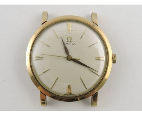 A 9ct Omega gentleman's watch head c.1950, with baton numerals and reverse engraved inscription.