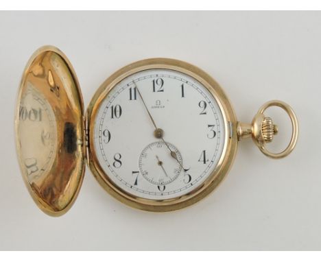 An early 20th Century Omega 14k gold full hunter dress pocket watch, the circular white enamel dial with subsidiary seconds m