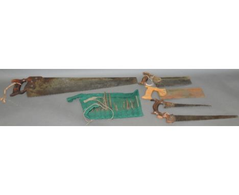 A small quantity of woodworking hand tools, mainly saws, together with drill bits, awls and carving chisels, (qty)